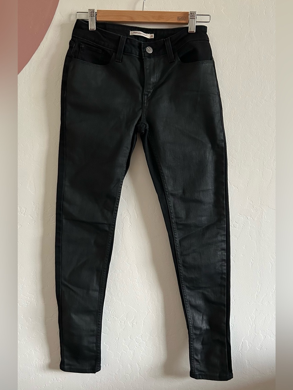 Levi’s Super Skinny size 28 black jeans with faux leather front panels
